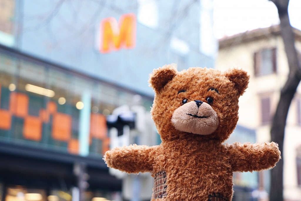Orange Migros Teddy Bear in the street