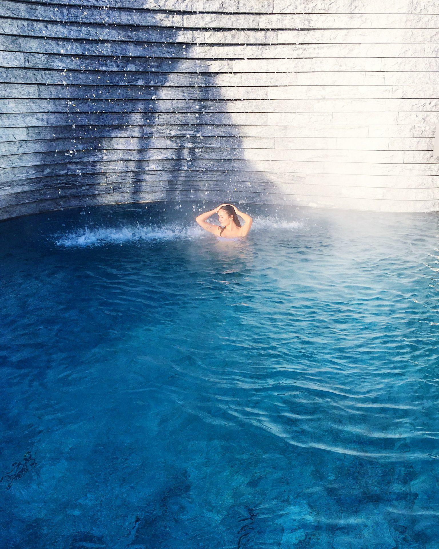 Geri in the outside swimming pool of Mario Botta Spa