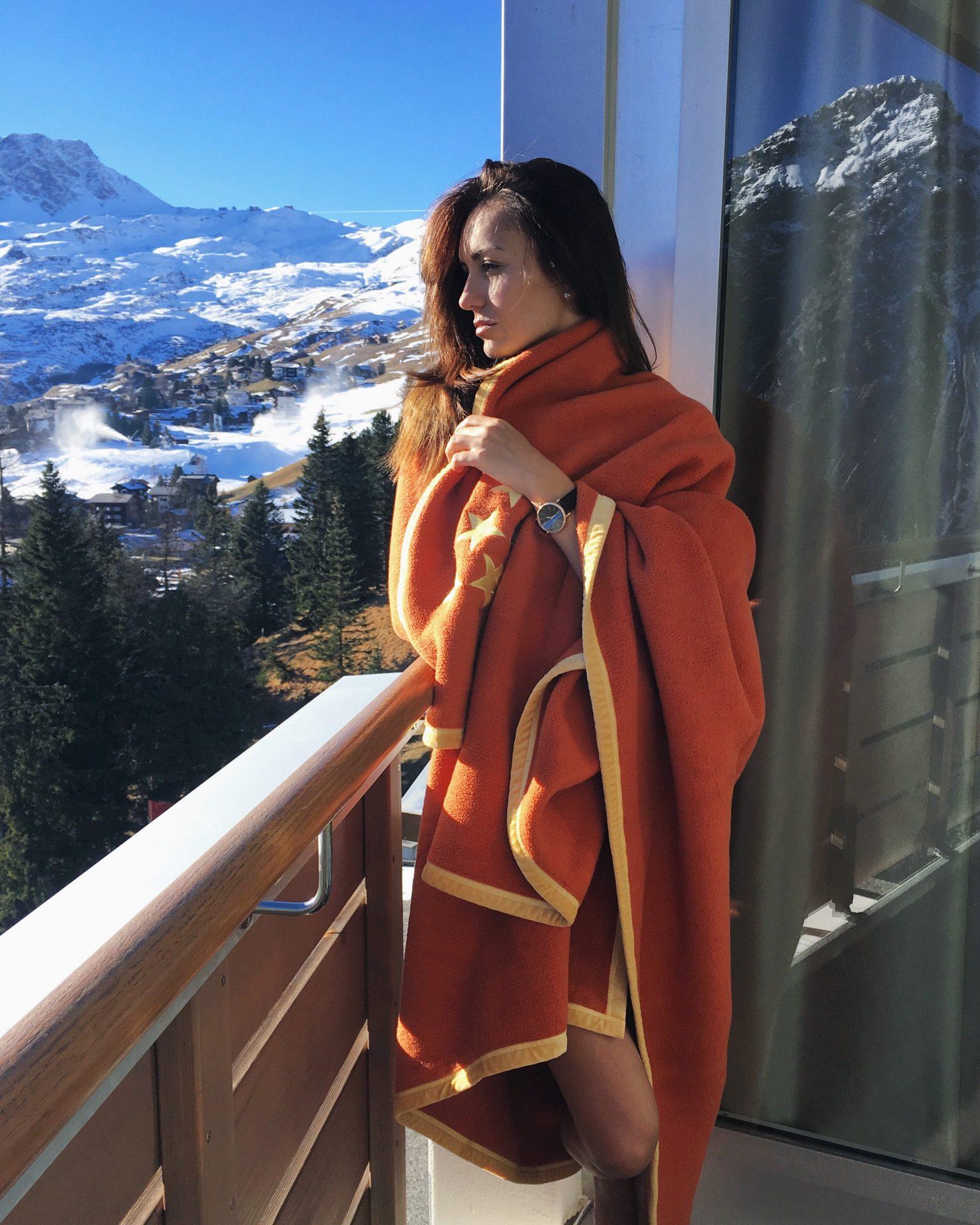 Geri in Arosa Hotel's room with a blanket