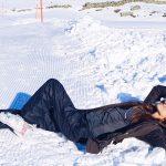 Gery lying in the snow in Arosa Tschuggen Grand Hotel